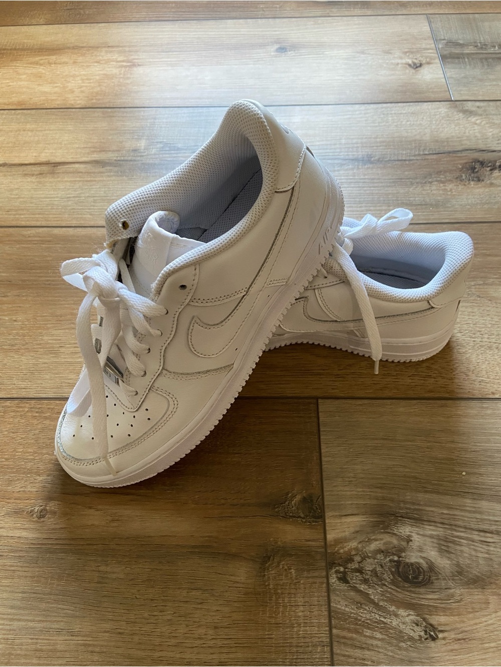 White Leather Low-Top Sneakers with Swoosh Detail